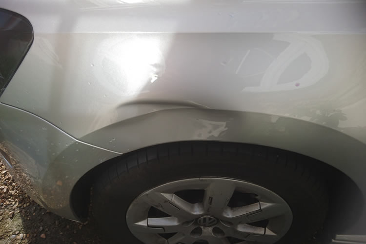 Volkswagen Polo with dent